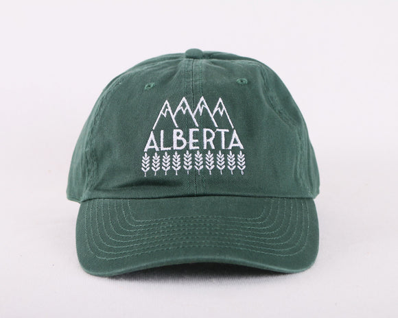 Green baseball cap with white embroidery on the front that says 