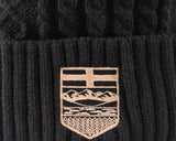 Alberta Crest Cable Knit Toque - Faux Fur Pom Pom