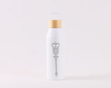 White water bottle with a brown bamboo screw top lid, with a gray laser engraved Alberta Mace on the front.