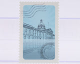 Stylized illustration of a building on a blue background with a white border