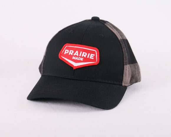 Black canvas ball cap with a red patch that reads 