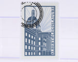 Stylized illustration of a building with 'Alberta Legislature' text on a white background